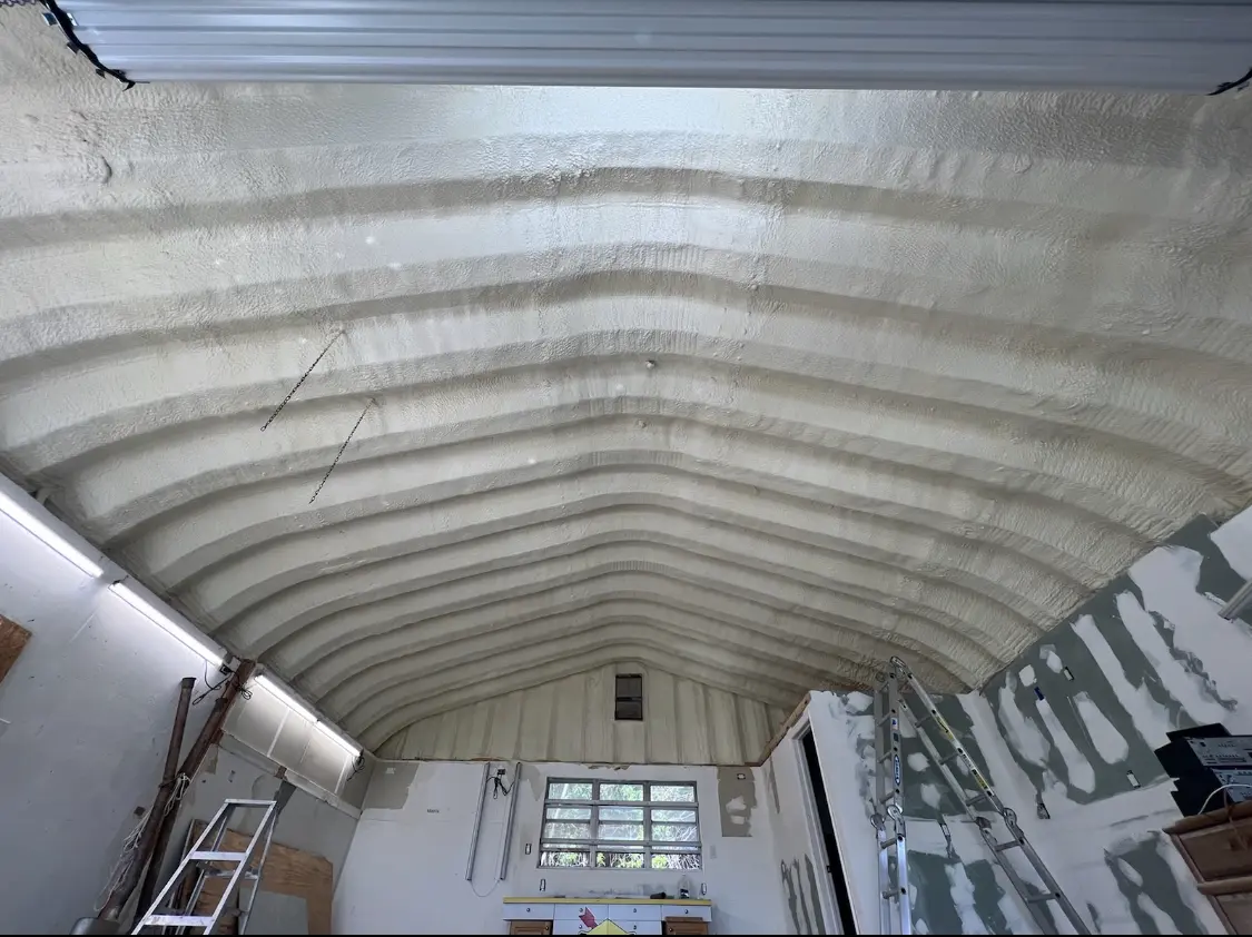 Spray polyurethane foam applied to the underside of a metal roof deck in West Boylston